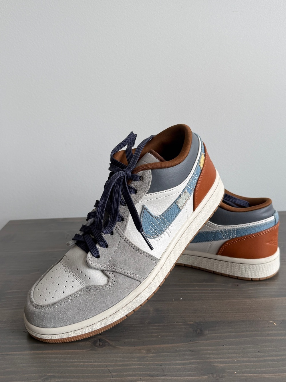 Air Jordan 1 Low SE’ repaired denim swoosh sneakers 
Men’s 9.5